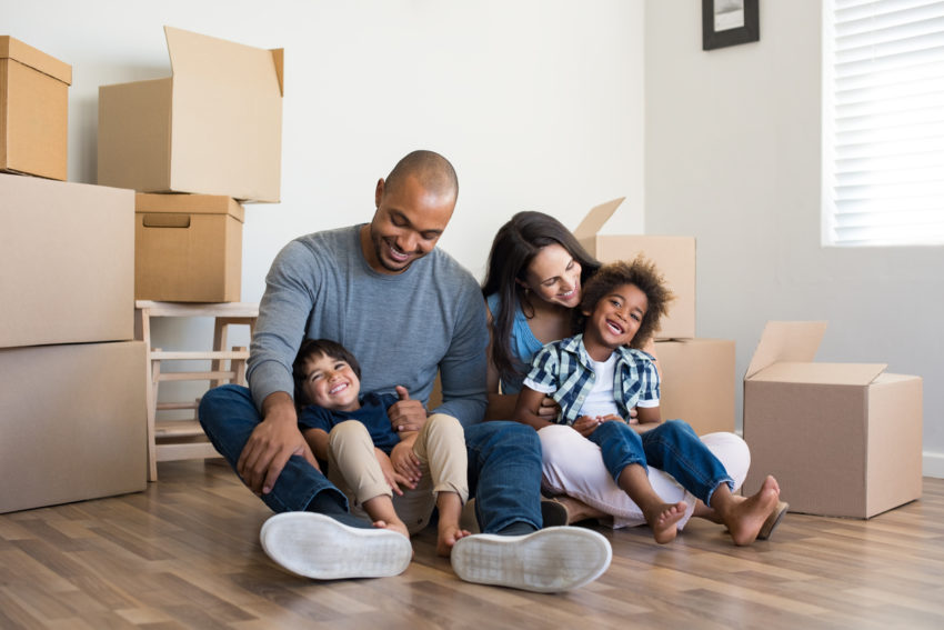 Family getting ready to move into a new home