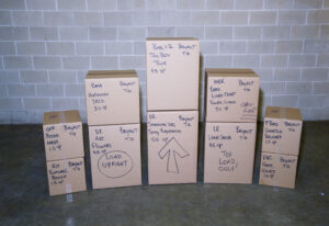 array of perfectly labeled Arpin of RI 1.5, 3.0, 4.5, and 6.0 boxes in a warehouse