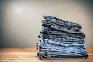 stacked blue jeans