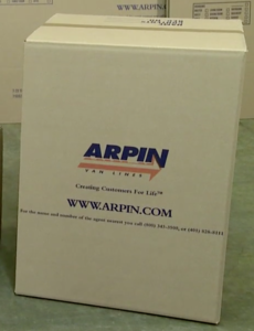Image of a fully packed and labeled Arpin of RI baby wardrobe. 